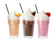 Glasses with delicious milk shakes on white background