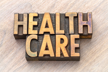 health care word abstract in vintage wood type