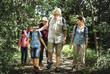 © Rawpixel.com - Family hiking in a forest