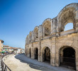 Arles France July 2015 : Arles amphitheatre and shops