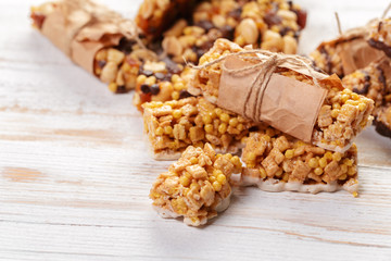 Granola bar on wooden background