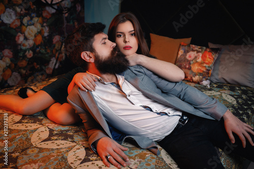 Young Hy Purchased New Apartment Preparing Housewarming Young Hy Purchased New Apartment Preparing Housewarming Party Embracing Looking At Each Other On Bed Caring Woman Hugging Man From His