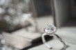 © Kwangmoozaa - luxury engagement Diamond ring in jewelry gift box with bokeh light background
