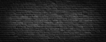 Black Brick Wall Background.