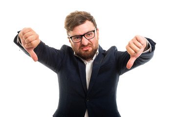 Wall Mural - Portrait of business man showing double thumb down gesture.
