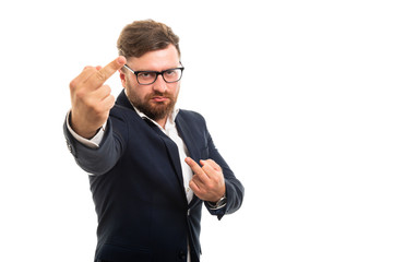 Wall Mural - Portrait of business man showing double middle fingers gesture.