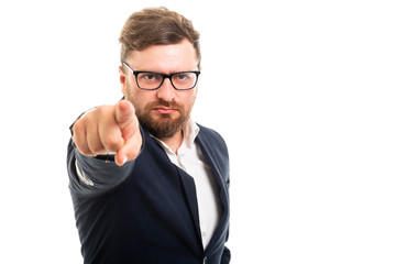 Wall Mural - Portrait of business man pointing with finger.