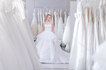 Beautiful woman in wedding shop