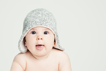 Cute small baby face closeup portrait on white banner background with copy space