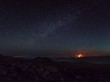 © GAM Studios - Scenic view of volcano against starry sky