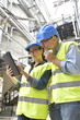 © goodluz - Industrial engineers working in recycling plant with tablet