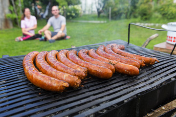 fresh sausage on a grill