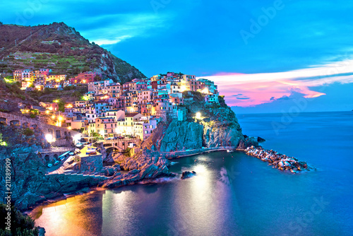 Magical beautiful landscape with bright colored houses on the rock on the sea...