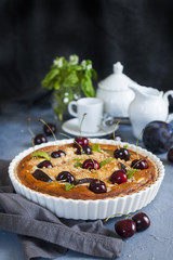 Canvas Print - Homemade almond and cherries cake, baked cream with honey and peaches and prunes