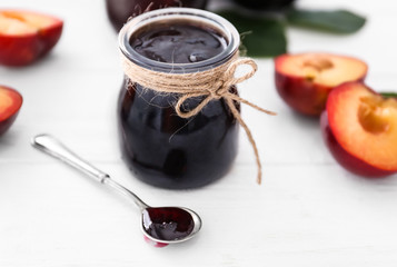 Sticker - Jar with tasty plum jam on table