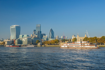 Wall Mural - London skyscrapers in financial district viewed from across the Thames river at sunny day, UK