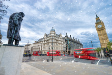 George Street Square With Red Buses In Motion And Falling Snow 