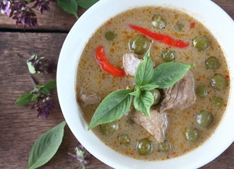 Wall Mural - green curry with pork in coconut milk thai food