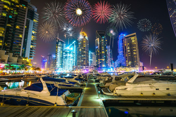 Canvas Print - Firework display at Dubai marina at night, UAE