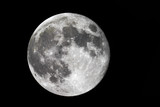 Fototapeta Na sufit - Full moon / The full moon is the lunar phase when the Moon appears fully illuminated from Earth's perspective. This occurs when Earth is located directly between the Sun and the Moon