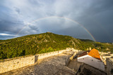 Fototapeta Tęcza - Sveta Nedjelja mountain near Hvar with beautiful rainbow, Croatia