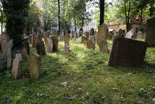 Historic Old Jewish Cemetery With Rock Tombs In Prague And Broken Monuments By The Passage Of Time