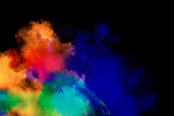 Wall Mural - multi color powder explosion isolated on black background.