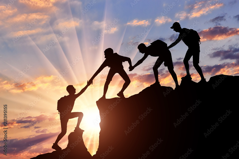 Stockfotot Men Climbers Help Each Other In The Mountains Adobe Stock breckie-hill-3-blacksportsonline