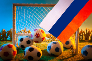 Flag of Russia at the football stadium. Football. Flag of Russia on the background of footballs. Football goal. National Football Team of the Russian Federation