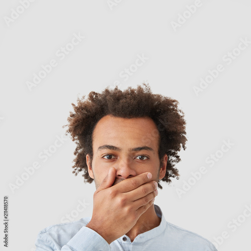 Mixed Race Male With Dark Skin Has Serious Expression Covers