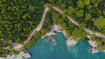 Wall Mural - top view of rocky shore crystal clear Adriatic Sea, drone shot