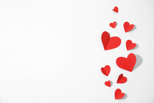 Small Paper Hearts On White Background