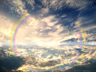 Wall Mural - reflection of rainbow and cloud on lake water
