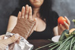 Sugar addiction, healthy lifestyle, weight loss, dietary, healthcare and medical concept. Cropped portrait of overweight woman choosing healthy food refusing chocolate bar