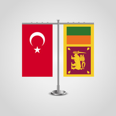 Table stand with flags of Turkey and Sri Lanka.Two flag. Flag pole. Symbolizing the cooperation between the two countries. Table flags