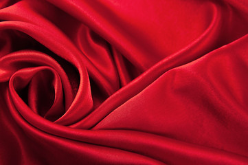 Abstract silk luxury background, piece of cloth, deep red cloth texture