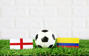 ball with England VS Colombia flag match on Green grass football 2018