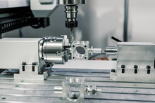 Precision Milling CNC Machine Tool Makes Part.
