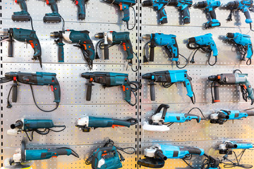 Hand-held power tools on stand in store