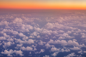 Poster - Flying above the clouds. Aerial view from the airplane