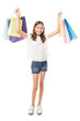 © AntonioDiaz - Beautiful girl holding shopping bags with raised hands