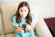 © AntonioDiaz - Child drinking cold drink with straw at home
