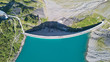 Aerial view of the dam of the Lake Barbellino, an Alpine artificial lake. Italian Alps. Italy