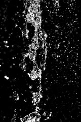  water jet with spray on a black background