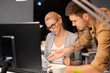 © Syda Productions - business, deadline and technology concept - colleagues with computer and papers working late at night office