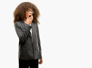 Sticker - African american business woman wearing glasses bored yawning tired covering mouth with hand. Restless and sleepiness.