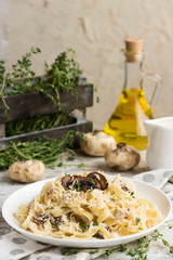 Wall Mural - Fetuchini alfredo with mushrooms and chicken ham in creamy cheese sauce