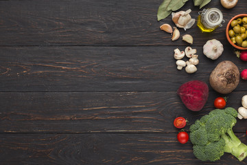 Wall Mural - Assorted raw vegetables on dark rustik wood, top view