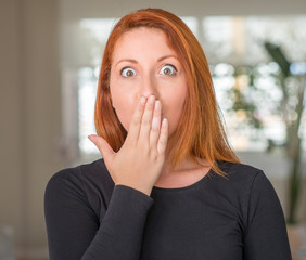 Sticker - Redhead woman at home cover mouth with hand shocked with shame for mistake, expression of fear, scared in silence, secret concept