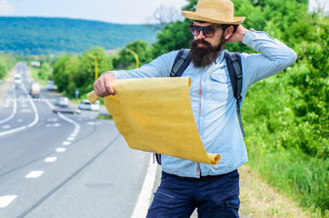 Find direction map large sheet of paper. Where should I go. Tourist backpacker map lost direction travelling. Around the world. Map allow recognize enough details to walk somewhere if get lost